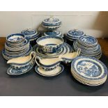 A large selection of Wedgwood "Willow" pattern china, to include various size plates, lidded dishes,