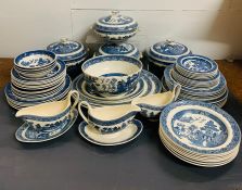 A large selection of Wedgwood "Willow" pattern china, to include various size plates, lidded dishes,