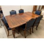 A large mahogany dining table, in the manner of Gillows with four turned tapering fluted legs