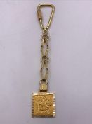 A Gold Key chain from Persia, marked 750 (16.5g)