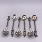 A selection of six Persian white metal teaspoons