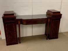 A mahogany pedestal sideboard, brake front centre section with one drawer flanked by pedestal ends