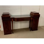 A mahogany pedestal sideboard, brake front centre section with one drawer flanked by pedestal ends