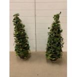 A pair of decorative artificial trees