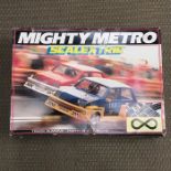 A boxed Scalextric mighty metro C880 racing set