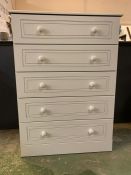 A white modern five drawer chest of drawers