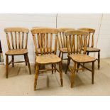 Six Elm chairs with bobbin turn side rails and upright