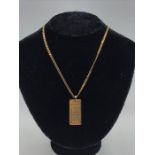 A 9ct yellow gold November pendant on a 9ct gold chain.(12g)