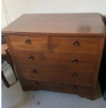An oak two over three chest of drawers