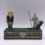 A Vintage Cast Iron Golf Themed Moneybox