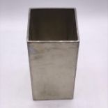 A White metal brush pot or vase.