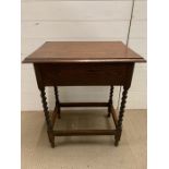 A mahogany side table with barley twist legs and drawer to one end (H73cm W60cm D46cm)
