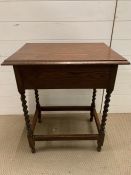 A mahogany side table with barley twist legs and drawer to one end (H73cm W60cm D46cm)