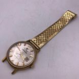 A Gents Omega Seamaster Antimagnetic 18ct gold No 16203, only half a strap (Total Weight 42.4g)