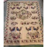 A cream rug decorated with birds and cockerels along with large center medallion (195cm x 151cm)