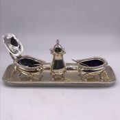 A JBC &S Limited Birmingham 1972-73 silver cruet set on silver tray to include pepper shaker, salt