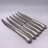 Six hallmarked silver knives