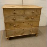 A pine chest of drawers two over three Af (H97cm W104cm D50cm)