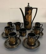 A Portmeirion Phoenix pattern coffee set.