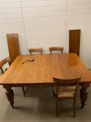 A Victorian mahogany extendable dining table with two additional leaves, on turned legs with four