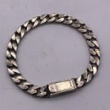 A Silver Gents Gucci Curb bracelet, marked 925.