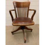 1930's swivel desk chair in original condition and leather seat