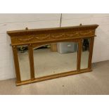 A gilt frame wall hanging mirror flanked each side with small mirrors (H77cm W130cm)
