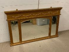 A gilt frame wall hanging mirror flanked each side with small mirrors (H77cm W130cm)