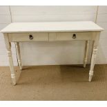 A white painted console table with two drawers (H76cm W114cm D40cm)