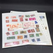 A small selection of stamps to include Spain, Guernsey, Algeria, mint, sets and used.