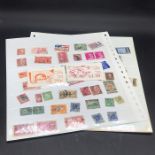 A small selection of stamps to include Spain, Guernsey, Algeria, mint, sets and used.