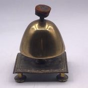 A vintage brass desk bell