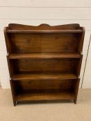 A mahogany waterfall open bookcase (H94cm H77cm D20cm)