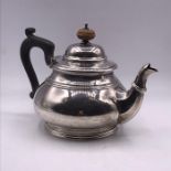 A Hallmarked silver teapot by Adie Brothers Ltd, Birmingham 1927 (Approximate weight 380g)