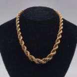 A 9 carat yellow gold graduated hollow rope link necklace to a bolt ring clasp with safety chain,