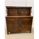 A Ercol buffet sideboard, old colonial 1960's (H125cm W117cm D47cm)