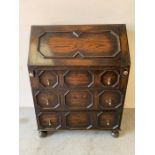 Oak bureau with brass fittings and various pigeon holes under the fall front (H101cm W76cm D43cm)