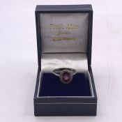 A Platinum Spinel and Diamond ring (Approx 2 to 2.5cts)