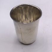 A Persian silver beaker.