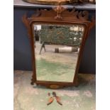 A mahogany wall hanging mirror with an eagle to the top A/F (H110cm W70cm)