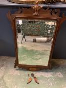 A mahogany wall hanging mirror with an eagle to the top A/F (H110cm W70cm)
