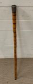 A bamboo walking stick with silver mount in a rocco style. hallmarked London
