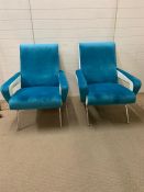 A Pair of Contemporary Armchairs in blue and white on chrome legs