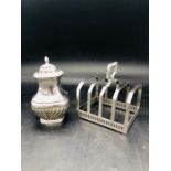 A Hallmarked silver pepper pot and a a hallmarked silver toast rack