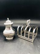 A Hallmarked silver pepper pot and a a hallmarked silver toast rack