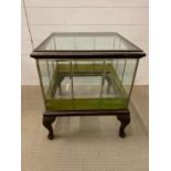 A Terrarium or \display Cabinet with green glass insets