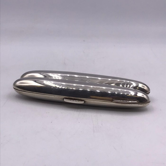 A Silver cigar case by George White, hallmarked for Birmingham.