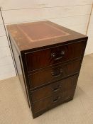 A mahogany leather topped filing cabinet (H74cm W49cm D65cm)