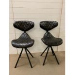 A Pair of Dark Leather chairs