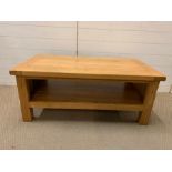 An oak two-tier coffee table (H45cm W110cm D60cm)